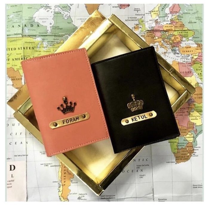 personalized passport cover for couple with name and a metal charm